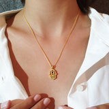 Men’s 14K Gold Hamsa Pendant with Natural Sapphire