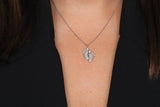 Tiny Baby Feet Necklace in Gold with Diamonds