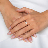 Round Shape Halo Style Ring in Gold with Diamonds