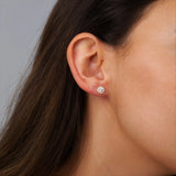 Round Shape Halo Style Earrings in Gold with Diamonds