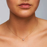 Round Halo Style Necklace in Gold with Diamonds