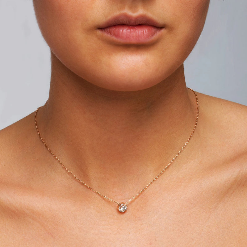 Round Halo Style Necklace in Gold with Diamonds