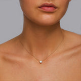 Round Halo Style Necklace in Gold with Diamonds