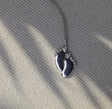 Tiny Baby Feet Necklace in Gold with Diamonds