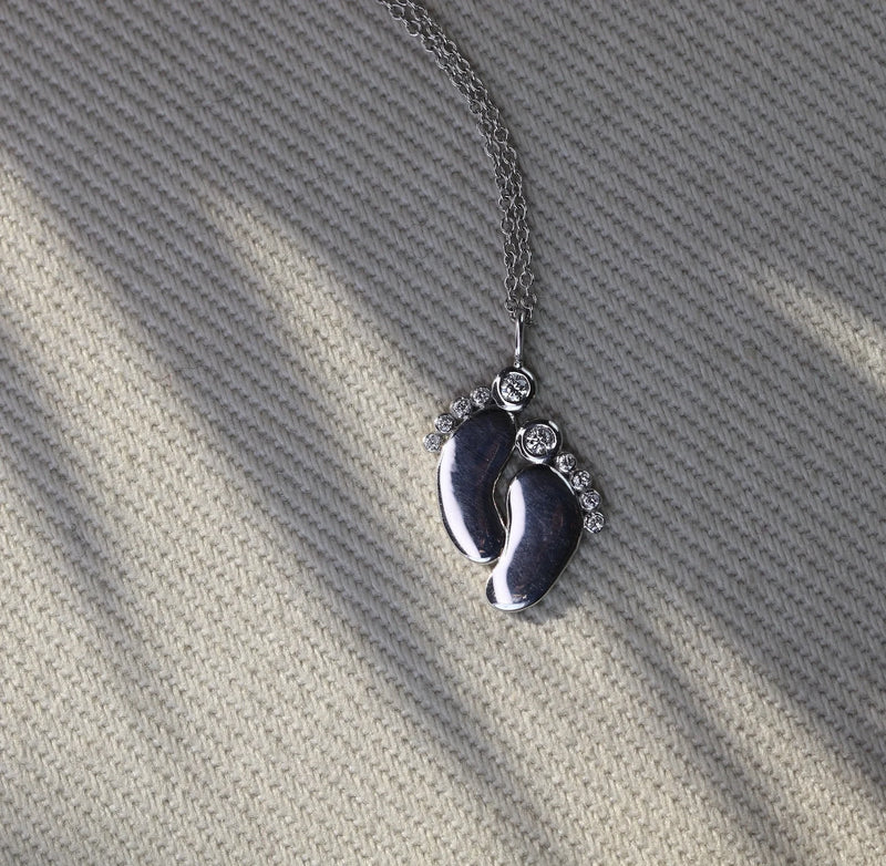 Tiny Baby Feet Necklace in Gold with Diamonds