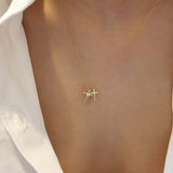 Tiny Cross Necklace in Gold with Diamonds