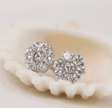 Flower Shaped Earrings in Gold with Diamonds
