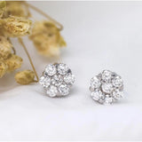 Flower Shaped Earrings in Gold with Diamonds