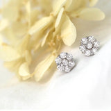 Flower Shaped Earrings in Gold with Diamonds