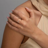 Cross Ring in gold with diamonds