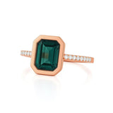Emerald Cut Ring in gold with diamonds