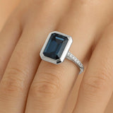 Emerald Cut Ring in gold with diamonds