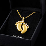 Tiny Baby Feet Necklace in Gold with Diamonds